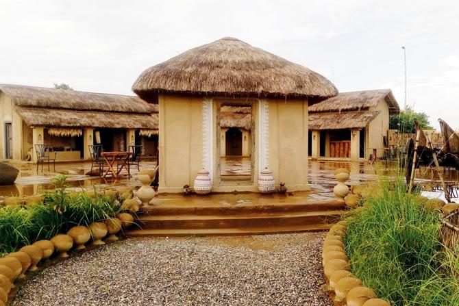 A replica of the traditional Tharu village created on the lodge premises