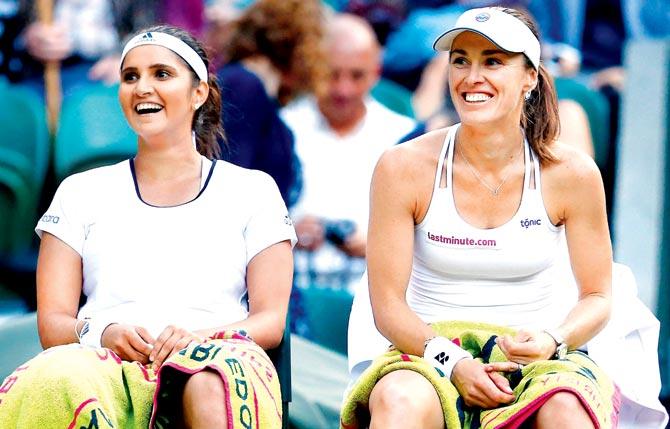 Sania Mirza and Martina Hingis. Pic/Getty Images
