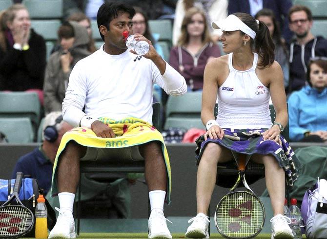 Leander Paes and Martina Hingis. Pic/AP, PTI