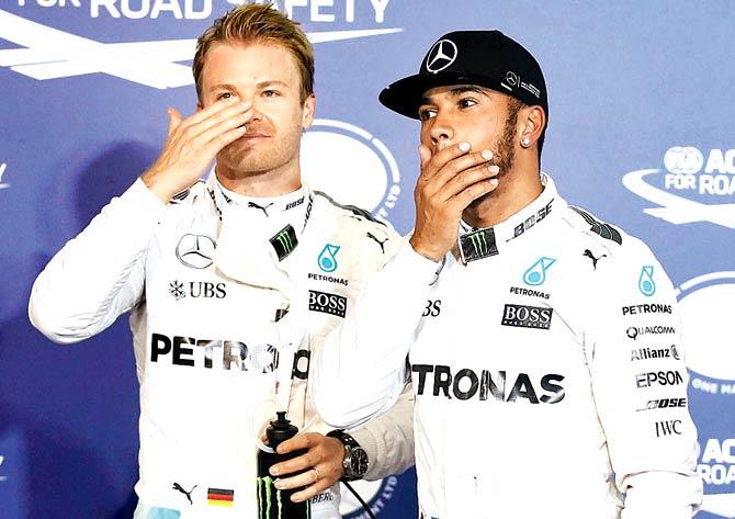 Mercedes Nico Rosberg (left) leads teammate Lewis Hamilton by 11 points in the Drivers