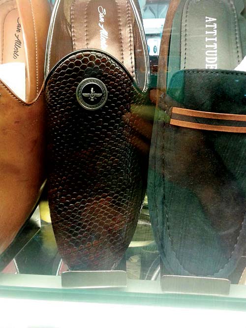 The shoes in Deepak Bhansali’s shop pinned with the Asho Farohar symbol