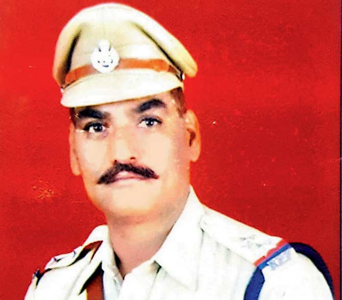 Sub-Inspector BS Narwar saved the woman from falling under the moving train