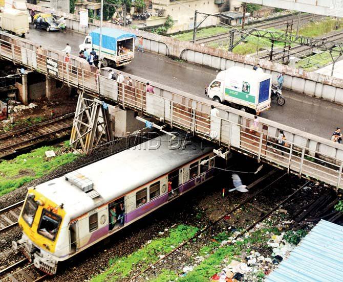 The Currey Road ROB is one of the problem sections, where the gap between the base of the bridge and the top of the AC train could be as little as 3 cm. Pic/Satej Shinde