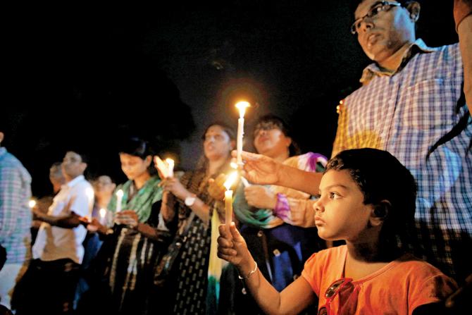 A candle-light vigil for Gulshan cafe victims in Dhaka. Pic/Getty Images