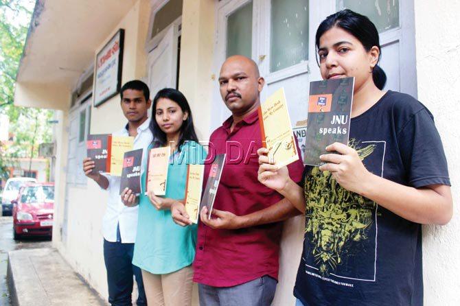 Members from various students’ organisations display a copy each of ‘JNU Speaks’. Pic/Prabhanjan Dhanu