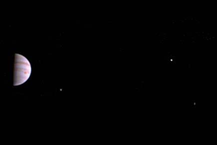 NASA's Juno mission sends first image of Jupiter, its moons