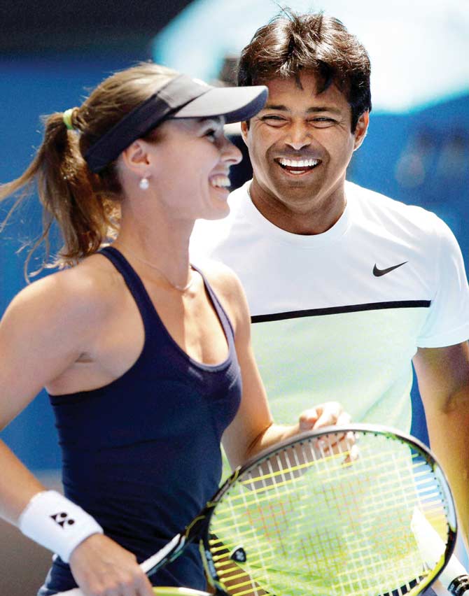 Martina Hingis and Leander Paes during their mixed doubles semifinal match at the Australian Open last year. Pic/AP/PTI