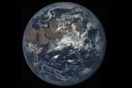 NASA camera captures moon 'photobombing' Earth again
