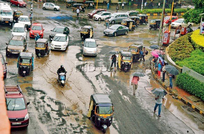 It’s the pits! Take a wild guess where this pockmarked road lies? No, it’s not the back of beyond, but the stretch of the Western Express Highway near Oberoi Mall in Goregaon East. The poorly repaired WEH has taken a pounding, as have all claims of monsoon preparedness. Pic/Sayed Sameer Abedi