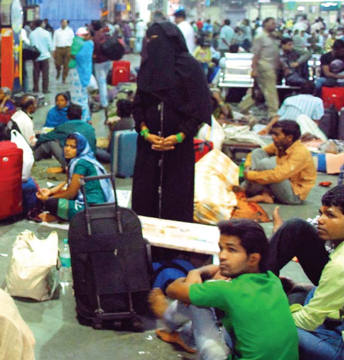 A horde of passengers occupying the concourse awaiting their trains is a daily scenario at CST station. File pic