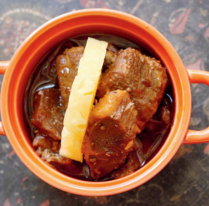Pork Adobo features the meat braised with soy and vinegar and spiced with cumin and oregano, cooked using the adobo practice of immersing meats in stock and spices, originating in Latin America and popularised by The Philippines