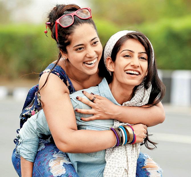 Prashashti Suvarna (back) and Shynee Narang (front) in a still from the video