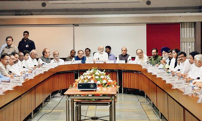 Prime Minister Narendra Modi, Home Minister Rajnath Singh, Finance Minister Arun Jaitley, Parliamentary Affairs Minister Anant Kumar, Congress leaders Mallikarjun Kharge, Ghulam Nabi Azad, Jyotiraditya Scindia at an all-party meeting ahead of the monsoon session, at Parliament House in New Delhi. Pic/PTI