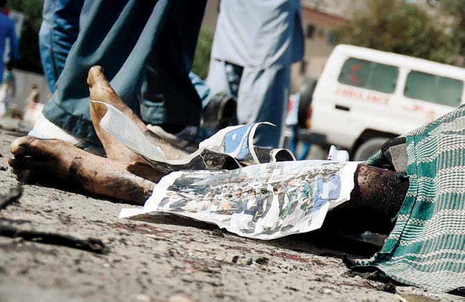 A victim at the site of the suicide attack. Pic/Getty Images