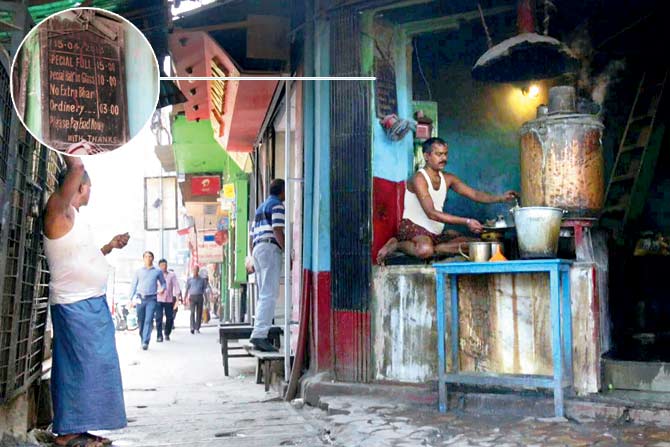 A tea stall on Bentick Street in Kolkata serves tea from a huge boiler, akin to a large samovar, used to boil the water