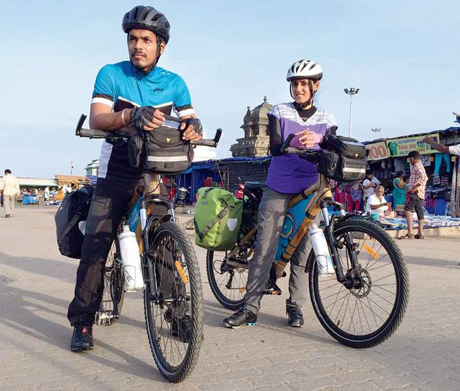 The cyclists, (from left) Sumeet Paringe and Prisiliya Madan at the starting point in Kanyakumari, Tamil Nadu