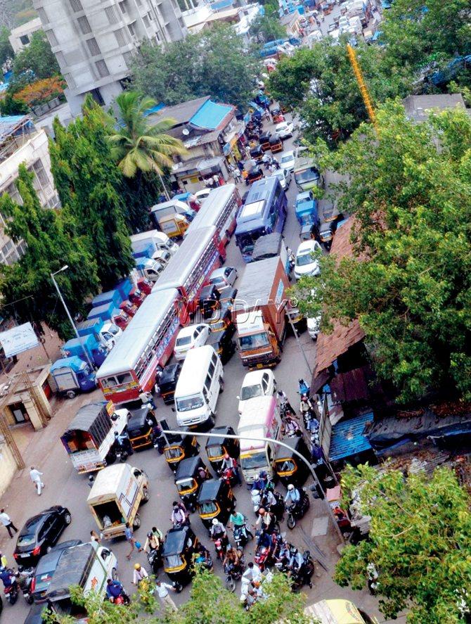 Traffic jam stretches as far as the eye can see at Bhandup on LBS Marg, which is yet to be widened. Pics/Datta Kumbhar