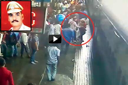 Video: Cop, commuters save woman, baby from falling off moving train