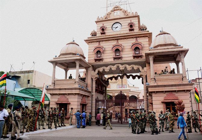CRPF and other security men stand guard at Lord Jagannath Temple ahead of annual Rath Yatra in Ahmadabad on Sunday. PTI Photo