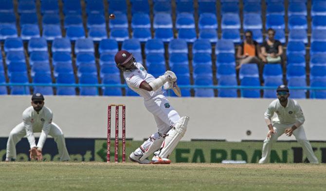 West Indies cricketer Devendra Bishoo bats during day three of the cricket test match between West Indies and India July 23, 2016 at Sir Vivian Richards Stadium in St John