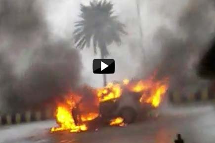 Watch Video: Car catches fire in Mumbai, leads to traffic jam