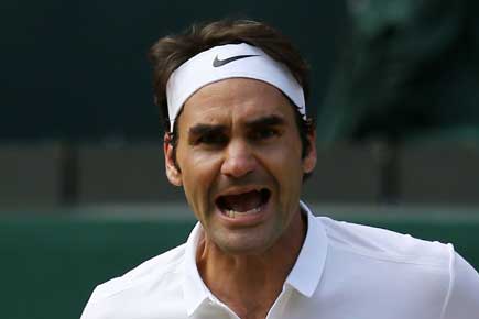Wimbledon: Federer saves three match points to reach semi-final