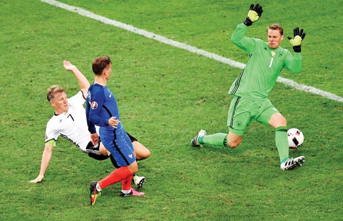 72nd minute: Griezmann (centre) taps in past German ’keeper Manuel Neuer (right) to make it 2-0