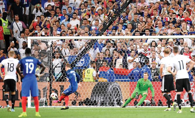 45th minute: France’s Antoine Griezmann scores the opening goal against Germany from the penalty spot 