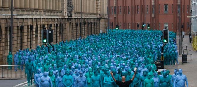 Naked volunteers, painted in blue to reflect the colours found in Marine paintings in Hull