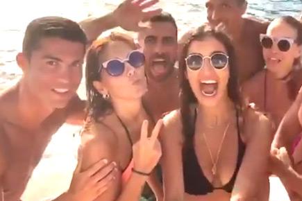 Cristiano Ronaldo shows off ripped body, parties with bikini babes