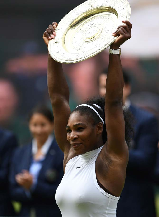 US player Serena Williams poses with the winner