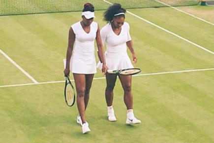 Serena and Venus Williams show 'sister love' at Wimbledon