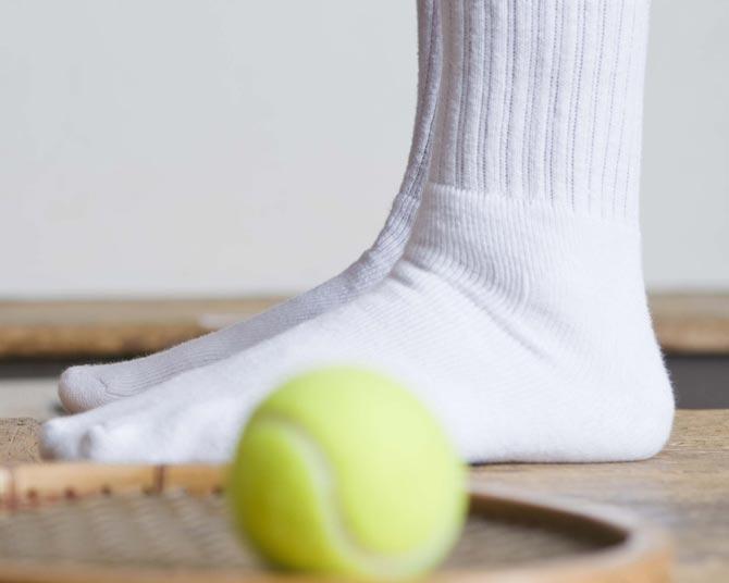 Tennis ball foot massage