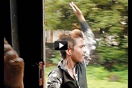 Video: Youth perform dangerous stunts in train's women compartment 