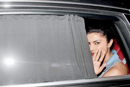 Why was Priyanka Chopra hiding behind blinds?