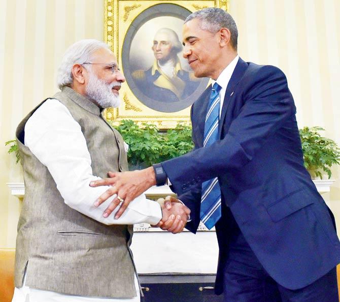 US President Barack Obama shakes hands with India’s Prime Minister Narendra Modi during a meeting at the White House. Pic/AFP