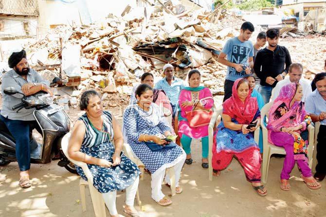 Anita Pinto (left), Magdalene Lobo (centre) and Sakira Patel (third from right) with other residents.