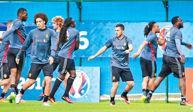 Belgium forward Eden Hazard (centre) trains with his teammates in Le Haillan, France yesterday ahead of their Euro 2016 clash vs Italy. Pic/AFP