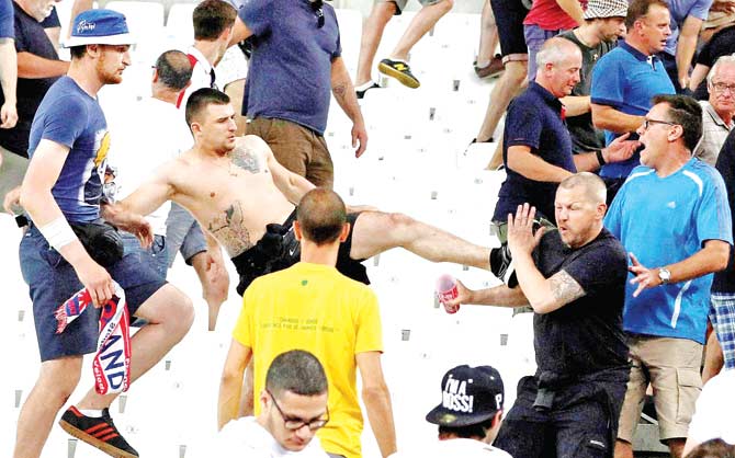Clashes break out in the stands after the 1-1 draw