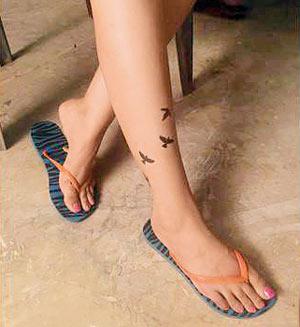 Parineeti Chopra (below) and her tattoo