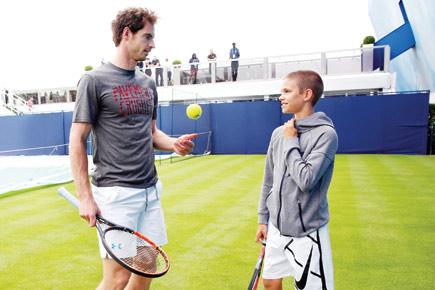 Andy Murray warms up for Queen's defence with David Beckham's son