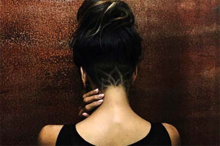 Halle Berry gets lotus-shaped undercut hair tattoo