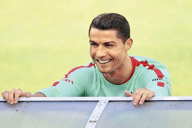 Portugal superstar Cristiano Ronaldo in a cheerful mood during a training session in Marcoussis ahead of their Euro clash against Austria. Pic/AFP