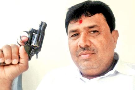 Navi Mumbai developer's gun and live cartridges stolen on train