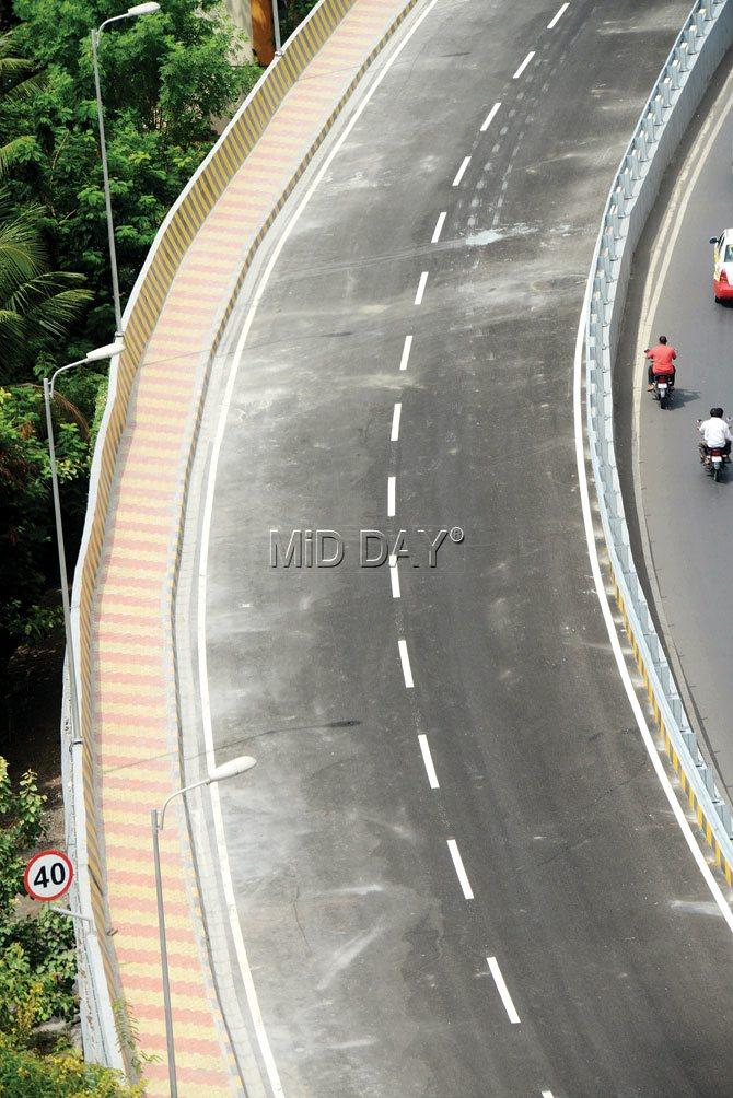 The road has been blacktopped and the marking of lanes has been completed. Pics/Prabhanjan Dhanu and Hanif Patel