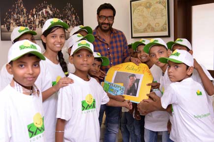 Ajay Devgn meets underprivileged children on Father's Day