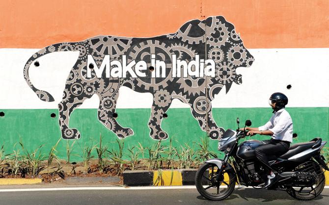 The Make in INdia push: The reforms will give a boost to employment and job creation, the Prime Minister tweeted. PIC/PTI