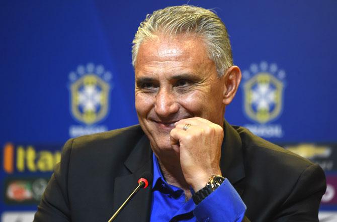 Adenor Leonardo Bacchi, known as Tite, smiles during a press conference after being appointment by the Brazilian Football Confederation (CBF) as the new national team coach, in Rio de Janeiro, Brazil. Pic/AFP