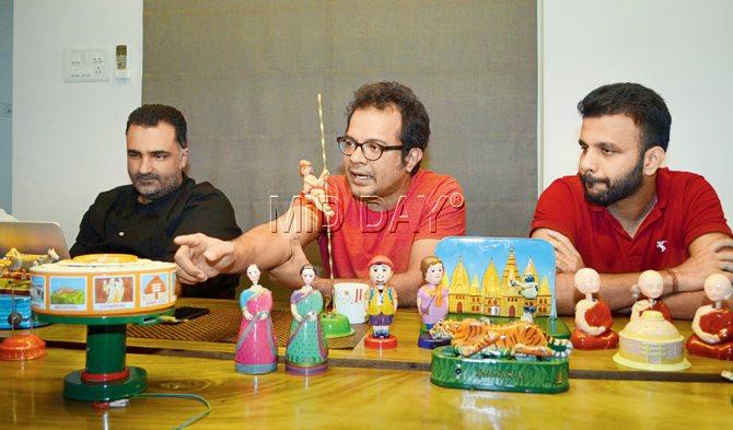 (L-R) Dharam Valia, Vijay Sawant and Vipul Indulkar with Madhya Pradesh Tourism ad’s toy-cast. Pics/Sneha Kharabe