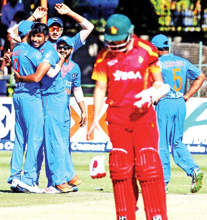 India players celebrate a wicket during the second T20 match vs Zimbabwe in Harare on Monday. Pic/AFP
